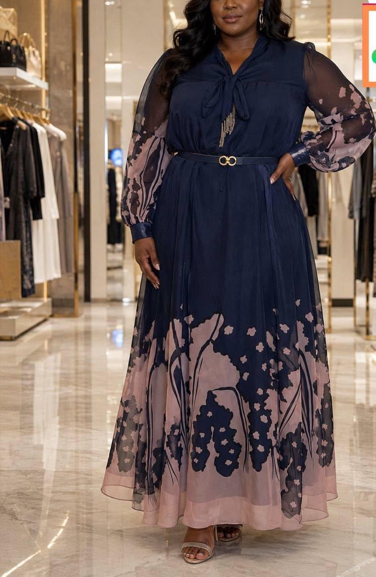 Robe longue en mousseline marine à bas de jupe brodé